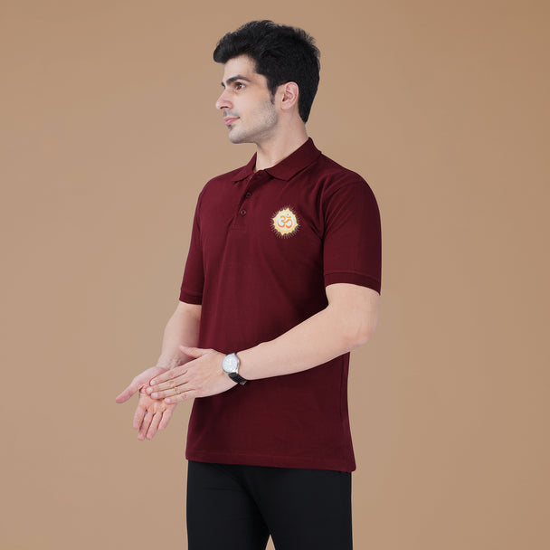 Model wearing the maroon Parambhakt Om Polo T-shirt featuring a glowing Om symbol design on the chest.