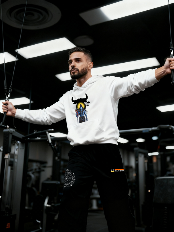 Man wearing the Parambhakt Shiv Nandi Training Hoodie while performing cable fly exercise in a gym, showcasing the Shiva artwork on the front.