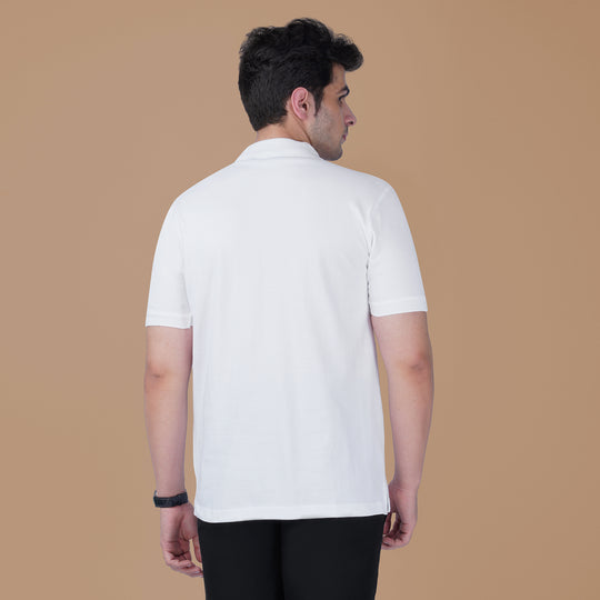 Back view of the white Parambhakt Siya Ram Tilak Polo worn by a model against a neutral studio background.