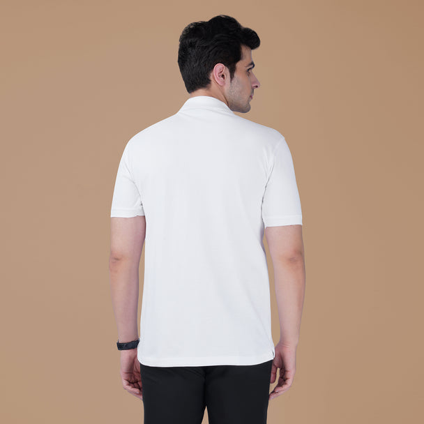 Back view of the white Parambhakt Veer Hanumanji Polo T-shirt worn by a model against a neutral studio background.