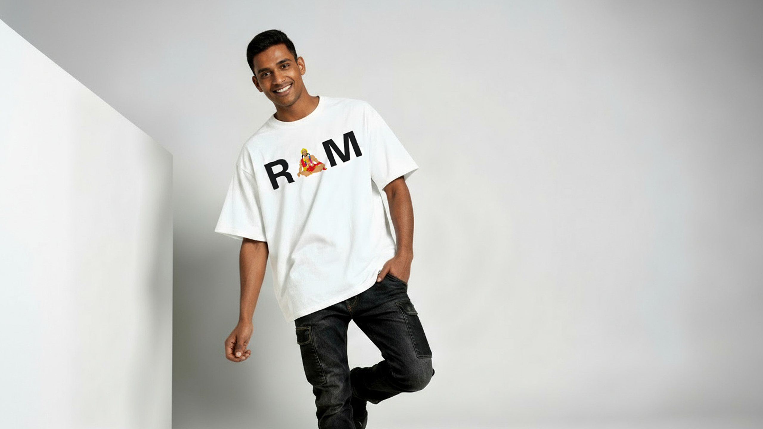 Model showcasing Parambhakt RAM Oversized T-Shirt featuring Ram ji artwork, premium spiritual apparel collection